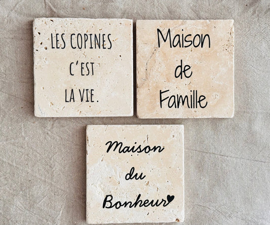 Set of three personalized natural stone ceramic dessous de verre with French messages for gifts or home decor.